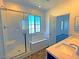 Bathroom featuring a shower, soaking tub, and double sinks at 20 Barbara Ln # 47, Las Vegas, NV 89183