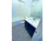 Well-lit bathroom with tiled floor, integrated sink and vanity, toilet, and shower-tub combination at 20 Barbara Ln # 47, Las Vegas, NV 89183