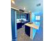 Contemporary kitchen with an island, stainless steel appliances, and modern finishes at 20 Barbara Ln # 47, Las Vegas, NV 89183