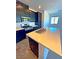 Modern kitchen features stainless steel appliances and a center island with sink at 20 Barbara Ln # 47, Las Vegas, NV 89183