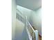 Bright staircase with white railing offering access to the upper levels at 20 Barbara Ln # 47, Las Vegas, NV 89183