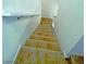 Stairway with carpeted steps and a white handrail ascends to the upper level at 20 Barbara Ln # 47, Las Vegas, NV 89183