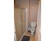 This bathroom features a shower with sliding doors and a standard white toilet at 220 E Flamingo Rd # 104, Las Vegas, NV 89169