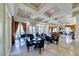 Comfortable common area with elegant seating, piano, and plenty of natural light at 220 E Flamingo Rd # 104, Las Vegas, NV 89169
