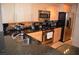 Kitchen features stainless steel appliances and granite countertops with wooden cabinets at 220 E Flamingo Rd # 104, Las Vegas, NV 89169