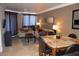 Comfortable living space with dining area, plush seating, and neutral decor at 220 E Flamingo Rd # 104, Las Vegas, NV 89169