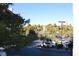View from property overlooking a parking lot with the High Roller in the distance at 220 E Flamingo Rd # 104, Las Vegas, NV 89169