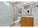 Modern bathroom boasts stylish herringbone shower, sleek vanity, and functional toilet at 2337 Prometheus Ct, Henderson, NV 89074