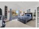 Bedroom featuring a private balcony, ample natural light and comfortable furnishings at 2337 Prometheus Ct, Henderson, NV 89074