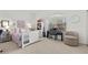 Cozy bedroom with plush carpeting, natural light, and stylish decor at 2337 Prometheus Ct, Henderson, NV 89074