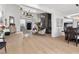 Spacious living area featuring modern furnishings, fireplace and open floor plan with dining at 2337 Prometheus Ct, Henderson, NV 89074