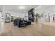 Spacious living room with modern fireplace, hardwood floors, and open layout at 2337 Prometheus Ct, Henderson, NV 89074
