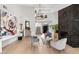 Open concept living room featuring a fireplace, seating area and artwork at 2337 Prometheus Ct, Henderson, NV 89074