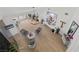 Bright living room featuring vaulted ceilings, modern decor, and light hardwood flooring at 2337 Prometheus Ct, Henderson, NV 89074