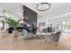 Bright living room featuring hardwood floors, fireplace, and modern gray furniture set at 2337 Prometheus Ct, Henderson, NV 89074