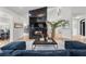 Bright, airy living room showcasing a modern fireplace, high ceilings, and stylish decor at 2337 Prometheus Ct, Henderson, NV 89074