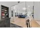 Modern office space with glass doors leading to a living area and backyard at 2337 Prometheus Ct, Henderson, NV 89074