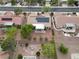 Aerial shot of home with solar panels, desert landscape, and backyard patio at 2512 Desert Glen Dr, Las Vegas, NV 89134