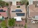 Aerial view of the home showing solar panels on roof, complemented by desert landscaping and community surroundings at 2512 Desert Glen Dr, Las Vegas, NV 89134