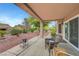 Inviting backyard patio with charming furniture, ideal for enjoying the outdoor space at 2512 Desert Glen Dr, Las Vegas, NV 89134
