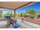 Relaxing backyard patio with seating, perfect for outdoor gatherings and relaxation at 2512 Desert Glen Dr, Las Vegas, NV 89134