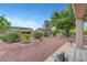Spacious backyard with desert landscaping, offering a low-maintenance outdoor area at 2512 Desert Glen Dr, Las Vegas, NV 89134