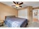 Comfortable bedroom with closet and ceiling fan, offering a peaceful retreat at 2512 Desert Glen Dr, Las Vegas, NV 89134