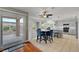Open dining area with kitchen view and sliding doors to the patio at 2512 Desert Glen Dr, Las Vegas, NV 89134