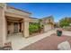Charming home featuring covered entry, security door, and a xeriscaped front yard, promoting water conservation at 2512 Desert Glen Dr, Las Vegas, NV 89134
