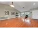 Bright living room featuring hardwood floors, high ceilings, and comfortable seating at 2512 Desert Glen Dr, Las Vegas, NV 89134
