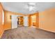 Bedroom with neutral carpeting and adjoining bath/kitchen area at 2707 Commitment Ct, North Las Vegas, NV 89031
