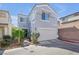 Charming two-story home featuring a two-car garage and low-maintenance landscaping at 2707 Commitment Ct, North Las Vegas, NV 89031