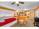 Upstairs living room and laundry area with modern amenities at 2707 Commitment Ct, North Las Vegas, NV 89031