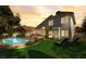 Serene backyard with pool, sun loungers, and a view of the home at dusk at 2714 Cricket Hollow Ct, Henderson, NV 89074