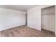 Bright bedroom with carpet, closet, and neutral color scheme, ready for personalization at 2825 Hickey Ave, North Las Vegas, NV 89030