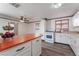 Eat-in kitchen featuring a retro breakfast bar, and an updated gas range at 2825 Hickey Ave, North Las Vegas, NV 89030