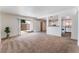 Bright living room with access to patio and view to the kitchen area at 2825 Hickey Ave, North Las Vegas, NV 89030