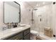 Modern bathroom with tiled shower, granite counters, and stylish fixtures at 3300 Uribe St, Las Vegas, NV 89129