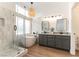Bathroom featuring shower, soaking tub, granite counters and double vanity at 3300 Uribe St, Las Vegas, NV 89129