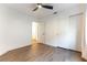 Bedroom featuring a modern ceiling fan, a closet and doorway at 3300 Uribe St, Las Vegas, NV 89129