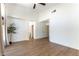 Bedroom featuring tall ceilings, bright lighting, and wood floors at 3300 Uribe St, Las Vegas, NV 89129