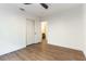 Bedroom featuring a modern ceiling fan, a closet and doorway to ensuite bath at 3300 Uribe St, Las Vegas, NV 89129