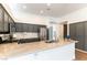 Modern kitchen with granite counters, stainless appliances, ample cabinetry, and an open layout for seamless entertaining at 3300 Uribe St, Las Vegas, NV 89129