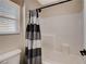 Bright bathroom showcasing a shower and tub combination, and a neutral color scheme at 3365 Moon Eclipse St, North Las Vegas, NV 89032