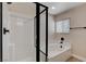 Bright bathroom with a modern, glass-enclosed shower and a relaxing soaking tub at 3365 Moon Eclipse St, North Las Vegas, NV 89032