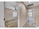 Comfortable hallway with carpeted floors and neutral walls connecting the bedrooms at 3365 Moon Eclipse St, North Las Vegas, NV 89032