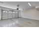 Clean, spacious garage with an automatic door and ample room for vehicles and storage at 3365 Moon Eclipse St, North Las Vegas, NV 89032