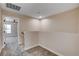 Hallway features neutral walls, plush carpeting, and leads to bedrooms for the home at 3365 Moon Eclipse St, North Las Vegas, NV 89032
