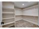 Walk-in closet with built-in shelving and ample storage space for organizing at 3365 Moon Eclipse St, North Las Vegas, NV 89032