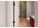 Bathroom with glass door shower and tile floors, and vanity at 3425 Fledgling Dr, North Las Vegas, NV 89084